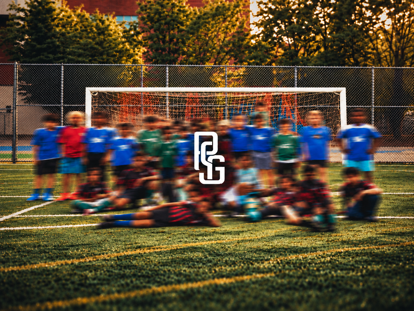 Parkdale Soccer Group team photo with an artistic blur and a white PSG monogram at the centre.